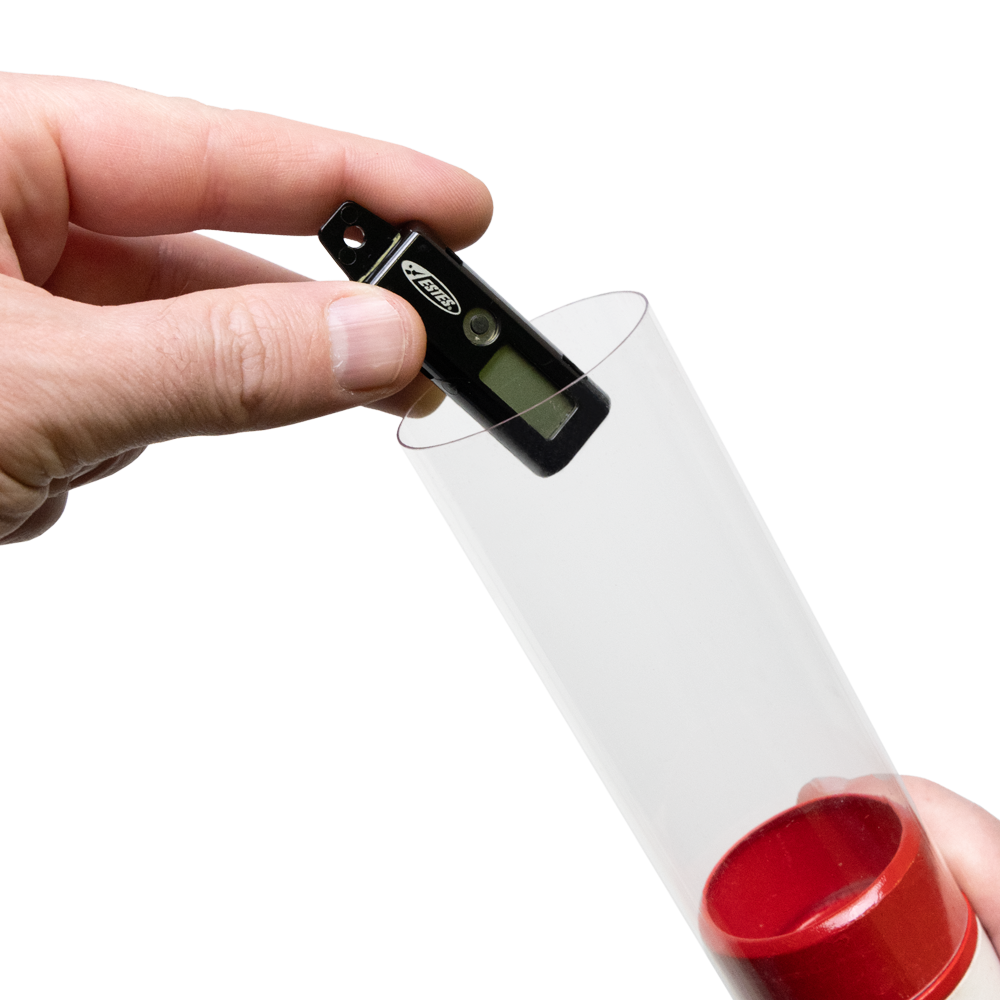 Estes Altimeter Model Rocket Accessory Being Placed in Example Payload Section