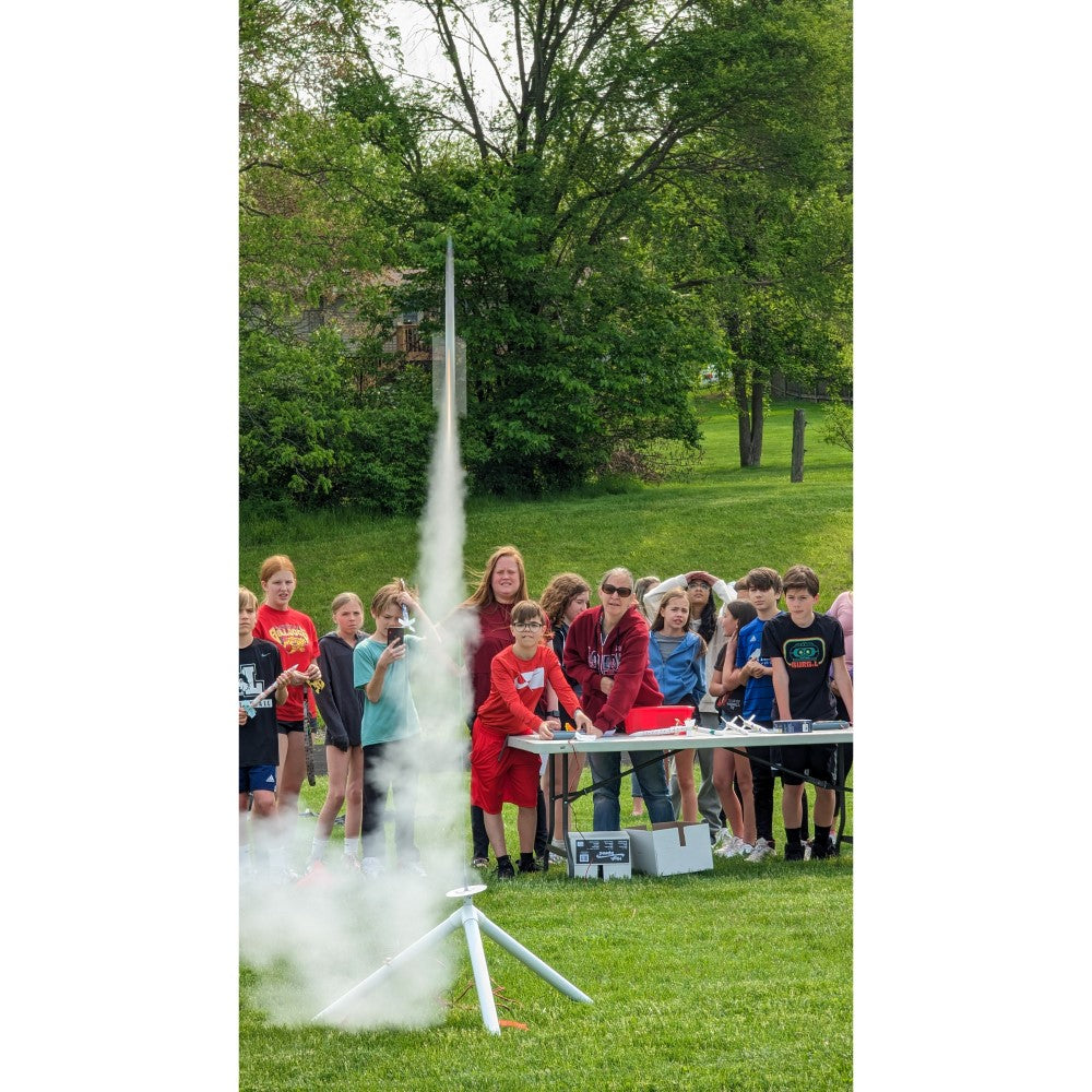 Group of students launching a model rocket 